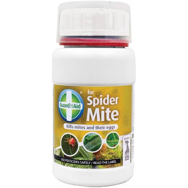A bottle of Guard n aid Spider Mite, a pesticide product designed for use on plants to control spider mites and their eggs.