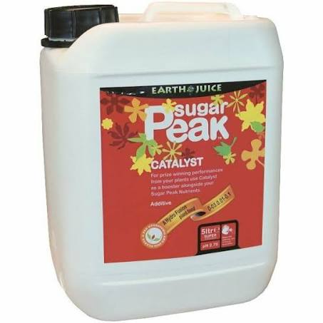 A 5-liter container of Sugar Peak Catalyst, with a predominantly red label featuring yellow and green accents, and text that includes the brand name 'Earth Juice'.